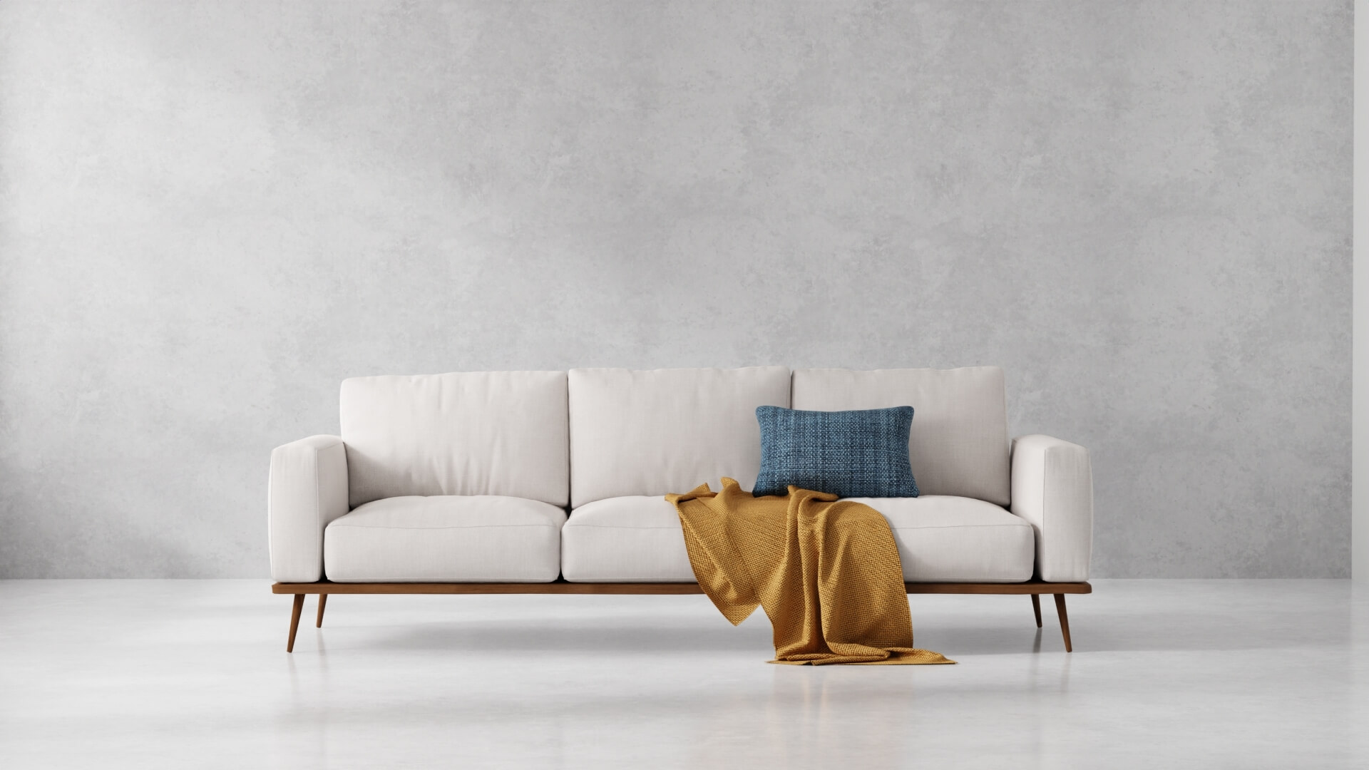 3D render of couch with pillow and blanket